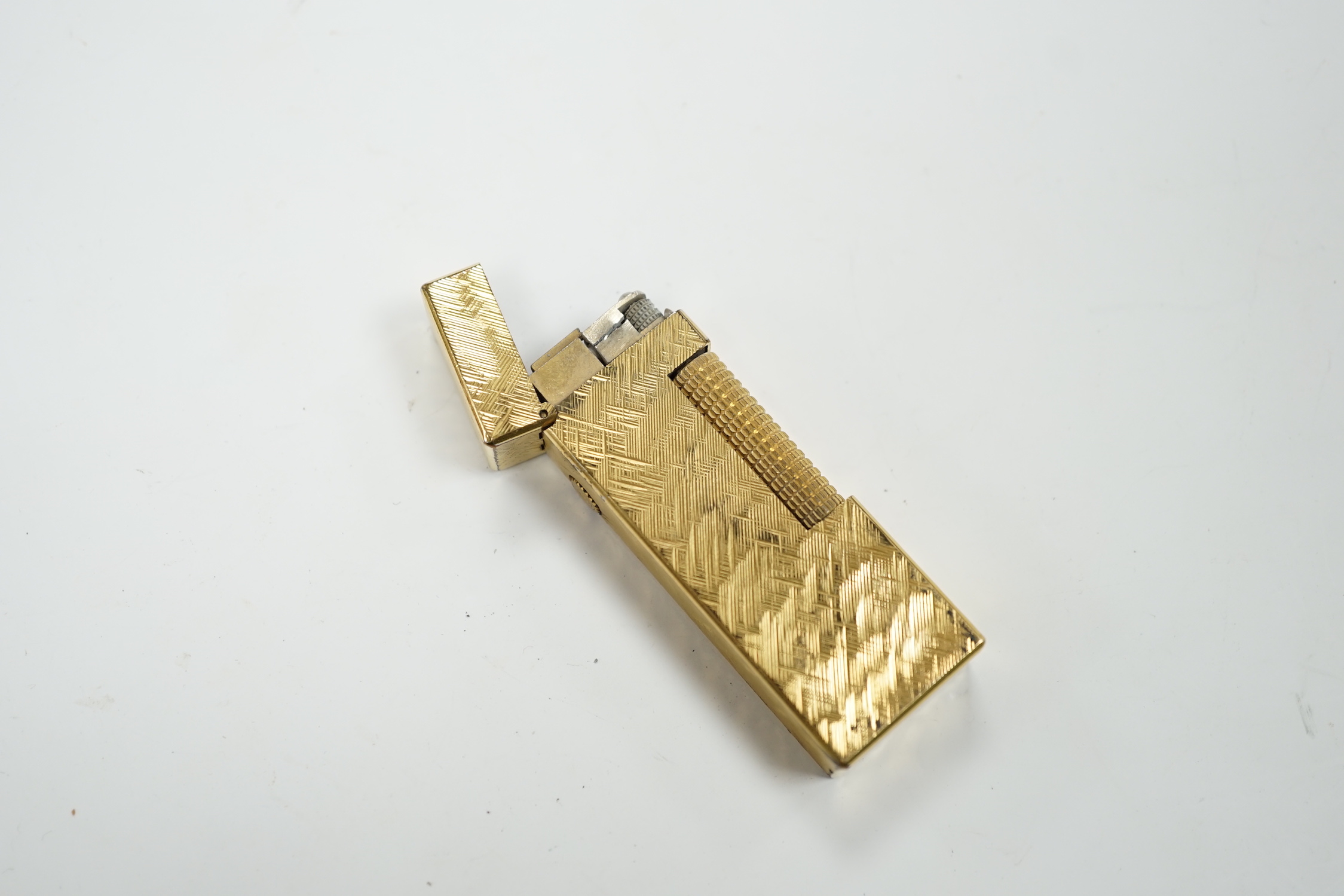 A cased gilt Dunhill lighter